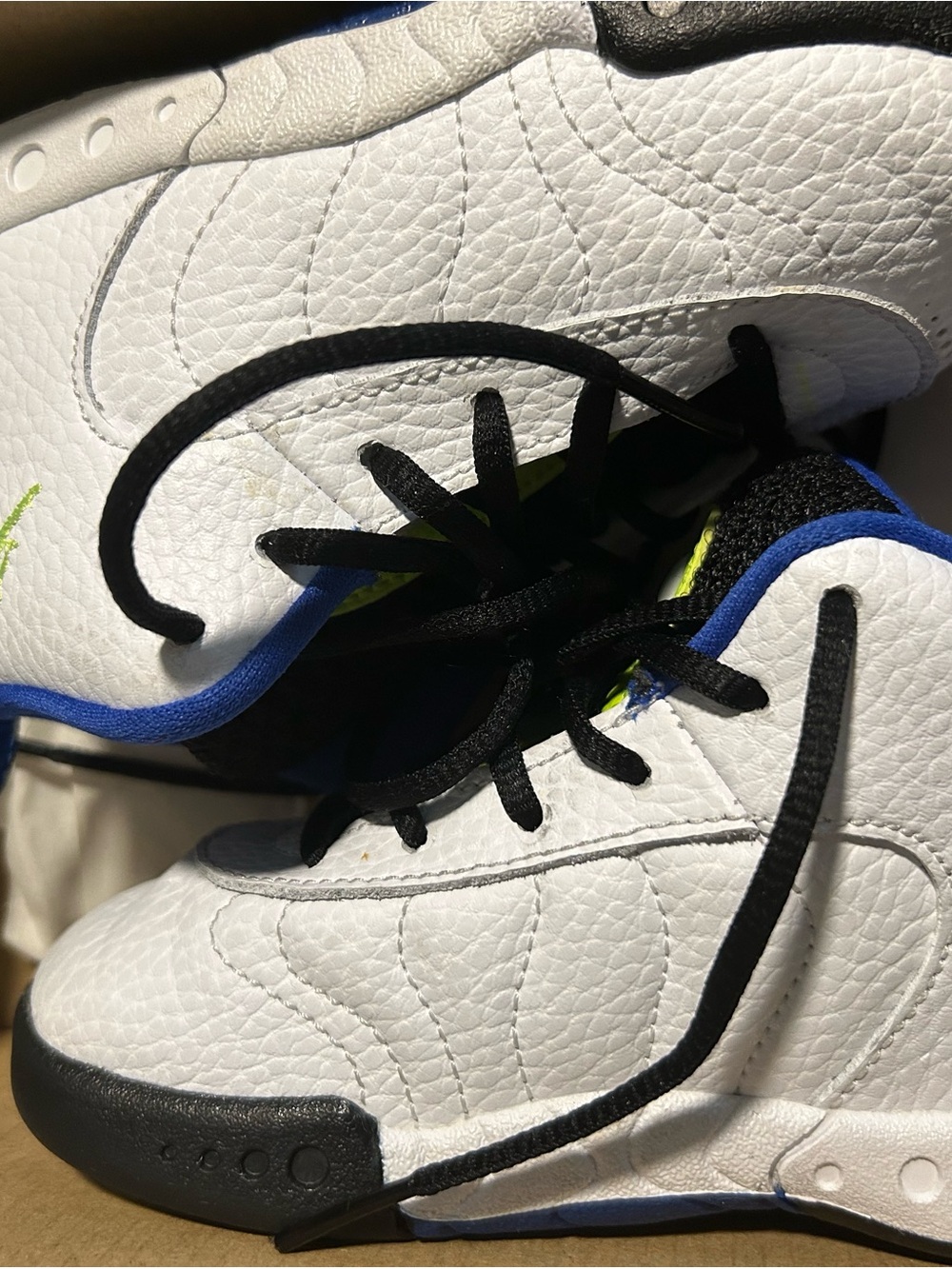 Jordan Kids White Sneakers with Blue Trim and Black Laces